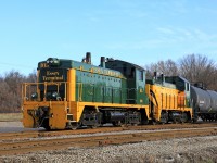 A pair of lookers, Essex Terminal 105 SW1200 and 104 SW14 team up to switch the Ojibway Yard in Windsor Ontario.