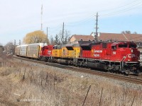 Late CP 237 approaches Streetsville with 7028 in lead and UP 3030 trailing