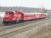 Cp Tec train comes flying by Guelph Junction with cp 2227 in the lead on a cloudy afternoon. 