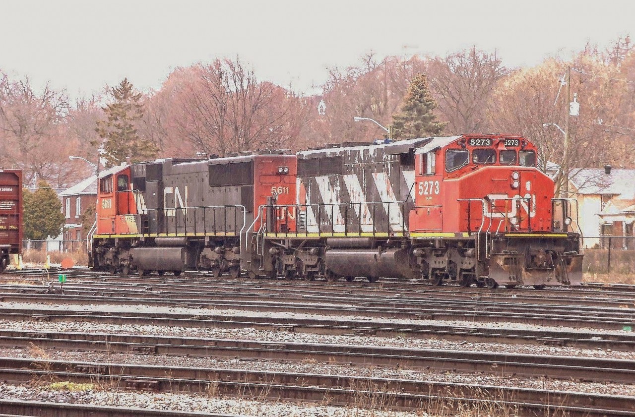 A rare visitor, CN SD40-2W 5273 sits with SD70 5611. The pair will lead the next train down to Garnet. Once so common in Ontario, today SD40's are a rarity.