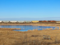 KCSM 4666 and KCS 4036 roll through the countryside east of Sedgewick, Alberta. 