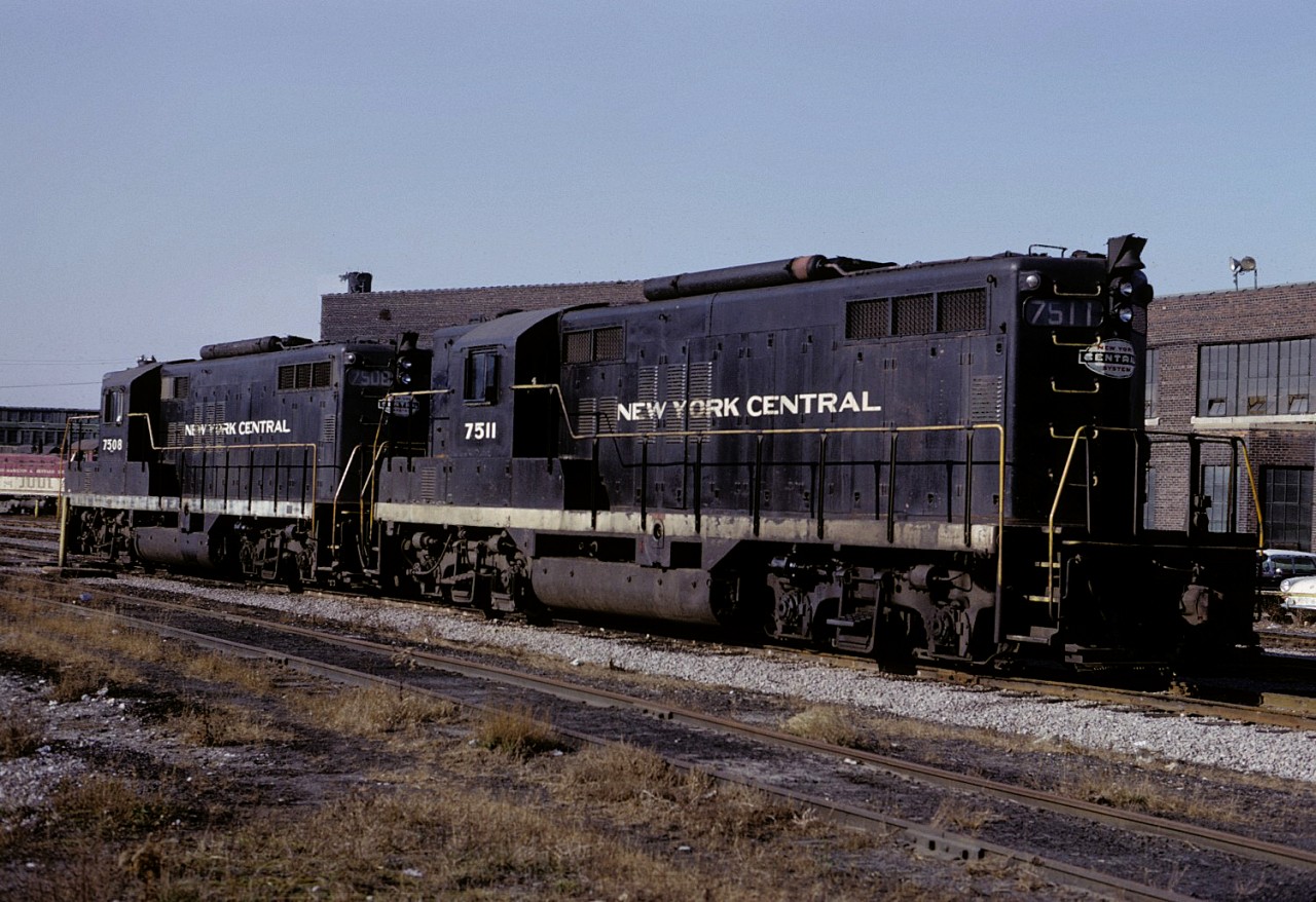 Having brought the overnight train into Hamilton from Buffalo and New York City, two steam generator equipped NYC GP9s (7511 and 7508) spend the day at the TH&B's Chatham Street roundhouse. Tonight, they will take over the New York-bound passenger train from CP units at the TH&B Hunter Street station and a CP unit will take their place laying over here until the cycle repeats the next morning.