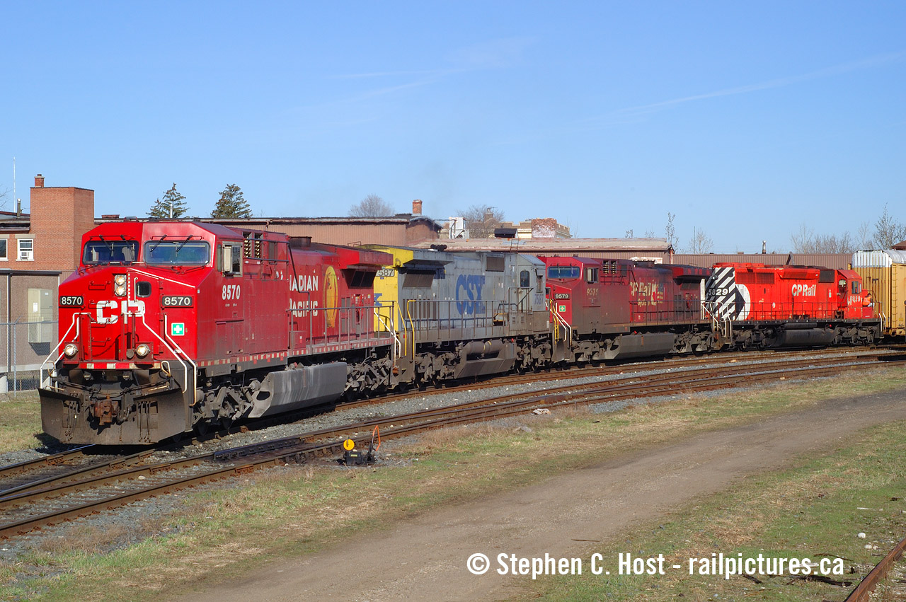 Back in the mid 2000's the "Electric Yard" (Grand River Railway) was a fairly busy place and you'd get great light on a few movements when they happened, so I'd drive to work in Waterloo from Guelph via Galt on nice sunny days hoping to catch action before I head to work for 0900, and you bet your ass I got action. There were usually about 4+ movements every early morning on the Galt sub. The mainline is to my back and this is where trains would head up the Waterloo Subdivision to lift autos from Toyota. Before Wolverton this yard and some tracks to the north was all CP had for Toyota movements from the mainline, meaning in order to keep things fluid about 6 to 8 trains a day would stop at Galt and work here. Pictured is train 138 making their morning lift out of Galt of autos from Toyota with a dogs breakfast consist - at the time any CSX in this paint was rare but I had no idea at the time, this was just a rare foreign Class 1 unit on CP. Other than 138, usual morning trains would be the day Galt job, and theHam Turn I got a few months later. Also the "Sprint" train aka "Frame Train" 142 would be blasting by behind me on the main if the track was clear to get to GM, and a pair of boring GP9's didn't really make you move very fast. CP Trains were everywhere back then and they snuck by often. What do you Galt guys remember for the traffic pattern back in the good 'ol days?