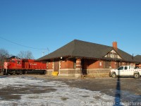 On a very late Winter's day in February, we find the London Pickup stopped at the Galt Station getting paperwork. They've just arrived from Guelph Junction and will go north onto the Waterloo Sub to grab their cut of autoracks to bring to London. Built in 1899, with a freight shed built in 1900, both buildings still stand today and are used by MOW crews. The CP (now CPKC) Holiday train will stop here for an event once a year, which is why there's Christmas lights on the outside, at least there was in the early 2000's.