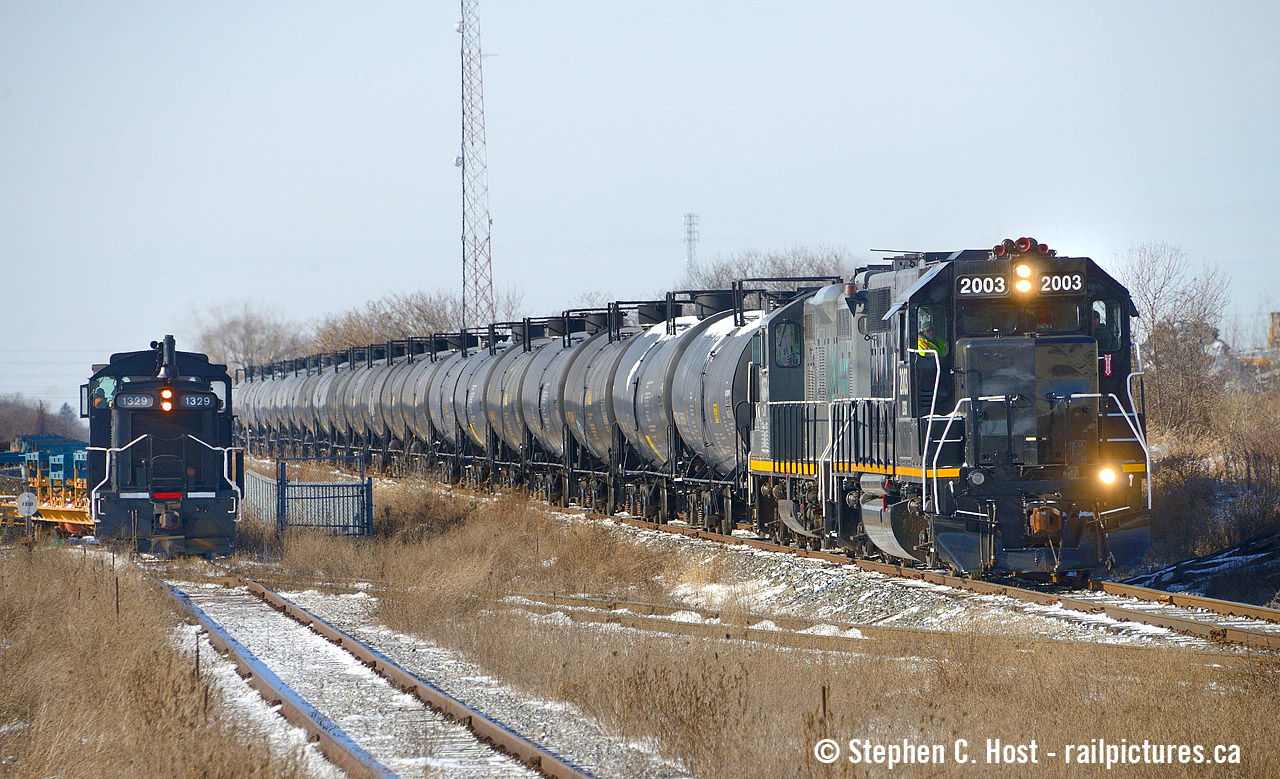With GIO departing east with 25 cars in tow, they're seen passing the Cando switching operation at Formet Industries, with SW1200 CCGX 1329 (nee CN) working the plant. GIO began humbly, with  Very short trains in the beginning but they have sure proved everyone they can bring the business. Soon, not far from here, construction will begin on a $20 million rail spur, including two overpasses  for the Volkswagen battery plant. The contract was awarded on Thursday and construction begins THIS month (April 2024). With the spur on the CN side of the Cayuga, it means CN will likely haul all the traffic, but it's not known who will get the switching contract for the plant. Surely there will be a ton of interest from local companies, such as Cando pictured, along with many other local switching contract operators.