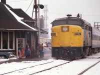 It is one of those damp snowy sloppy days at the old Burlington West (Freeman) station.  Eastbound VIA 6762 is making a stop.  I am wondering if this is the mid-morning #84.  These days the area is now barren, as the station was moved over to Fairview Av., preserved as a museum. The opening of the large GO facility just to the east made the Burlington West station redundant. 