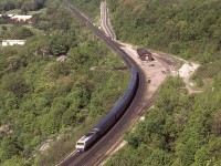 Beautiful morning for photography, but I am too high up on Dundas Peak to read #70's engine number. These BBD LRC units were rather short-lived on VIA due to numerous problems with their operation. They lasted but 20 years, from early 1980s to around 2001. Things are not the same any more on the peak either. Controlled parking and fat entrance fee to the area has pretty well kept the fans from bothering this location any more.