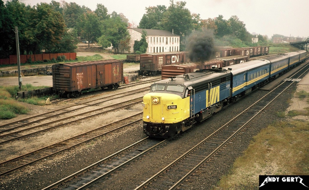 In fall 1987, VIA Rail FPA4 6788 departs the Woodstock, Ontario station on the CN Dundas Subdivision heading west to London.