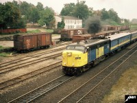In fall 1987, VIA Rail FPA4 6788 departs the Woodstock, Ontario station on the CN Dundas Subdivision heading west to London. 