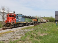 CN L568 continues west after completing its work at New Hamburg with a colourful lashup consisting of GTW 6420-BNSF 2926-BNSF 2090. 