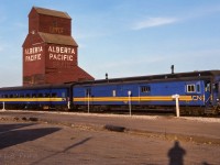 The tail end brakeman was about to give, "that'll do", over the radio. The mixed train was making a stop in Redwater on this evening. There was 35 boy cubs taking a ride from Edmonton to here. In a few minutes, the parking lot was a buzz of excitement as they all de-trained, loudly talking about their ride. In another 15 minutes, all was quiet as they headed back home to Edmonton. What kid doesn't like a train ride? :^) Photo taken at 20:00. Talked with the tail end brakeman for a few minutes afterwards, he was just as revved up as the kids.