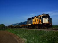 VIA 69 for Toronto has a wrapped F40 for power as it heads west with six LRC cars.