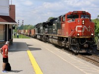 It is so unfortunate that today so many one time open and easily accessible locations are now filled in or completely closed off. While Georgetown is still shootable it is certainly not the location it once was. Nevertheless the beautiful old station still from time to time calls for a visit, especially considering the history it holds. For me it is also the place where many early railfan memories were made. Here CN 148 stays ahead of the increasing cloud cover as it passes onlookers at the old station. Still an active GO transit/VIA station, one can only imagine the stories its walls could tell. 