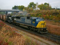 As always, you never know what power would be on NS 327.  On a dreary November morning, a late running NS 327 works up the Cow Path with CSXT 8762 and NS 5511. 