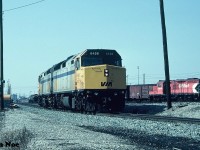 Leased VIA Rail F40PH-2’s 6458 and 6454 have rolled-off the shop tracks at CP’s Toronto yard diesel facility. The pair are heading to the east end of the yard where they are likely heading for a waiting train destined for the Belleville Subdivision or possibly a transfer run. During 1994-1995 CP had leased several VIA Rail units to assist them through their severe motive power shortage until the new GE's that were on order started arriving.