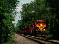 An empty ballast train from Maine is on the Farnham Connection as it makes the turn from the Adirondack Sub to the Vaudreil Sub. It will leave its cars at Lachine IMS Yard, to be picked up by CPKC 113 later that night. Power is a KCS SD70MAC and a CP SD30C-ECO.