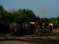 IC 9628 is leading as CN 536's light power starts to move at the start of its shift.