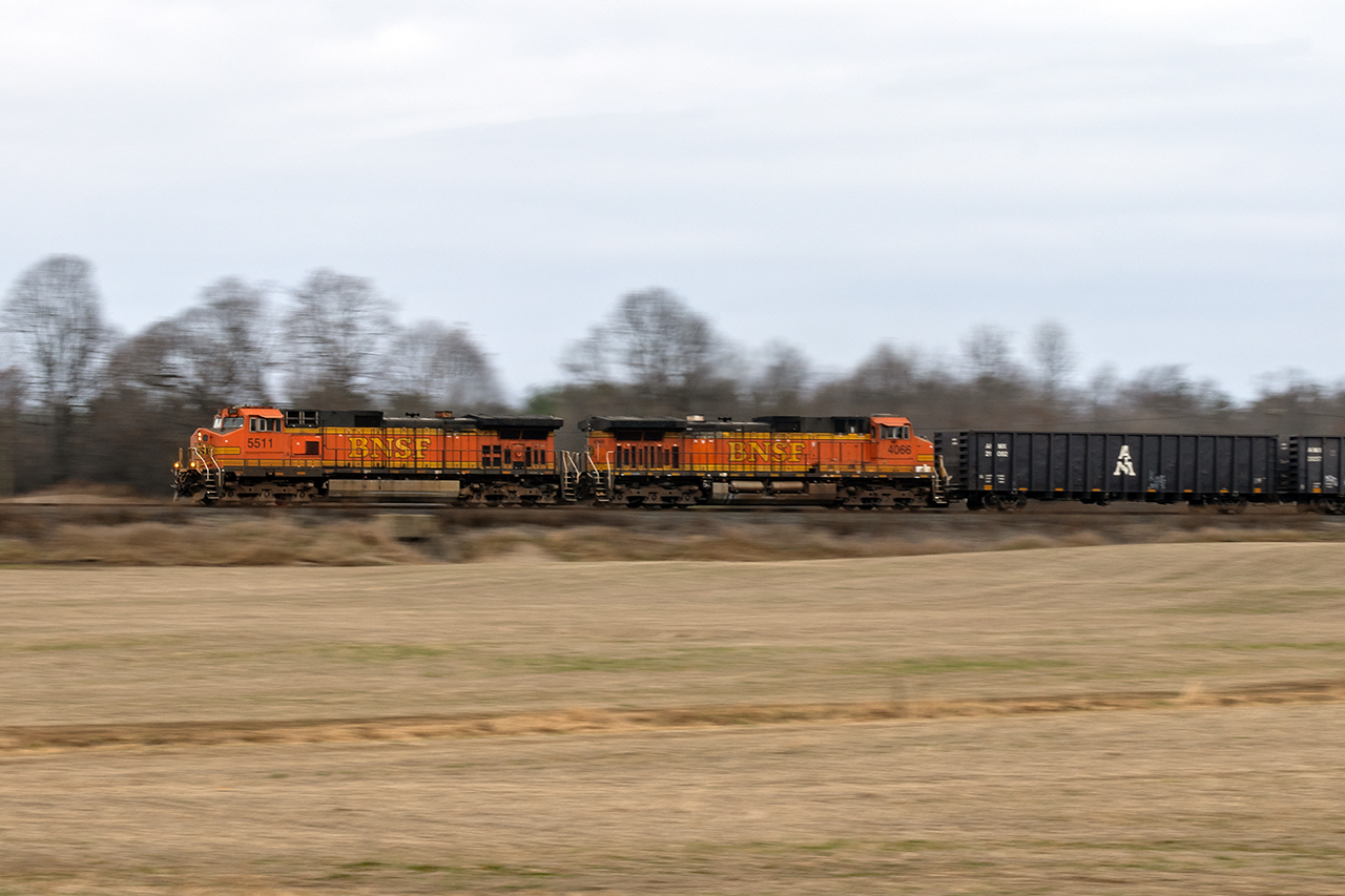 You never really know what might happen. The long story....two days ago, Toronto-Detroit 135 (CP BNSF)had the CP engine fail around Milton. BNSF 4066 was dispatched from London or Ayr where it had been the power on empty rack train 734. At some point after that, 238's 2 CP GE's that were sitting in London were put on 135...or it's return 134. No idea what happened to the failed CP, but the 2 BNSF's were left to power 238 from London to Welland. 

Which gets us to their return trip to London...in terrible light, so I gambled on 1/20th in the wind and tried to pan. In an mostly GE world, you try to find things to keep it interesting.
