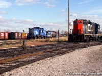 CR SW1500 9528, CR SW1500 9567, and CN GP9 4522 in Fort Erie.