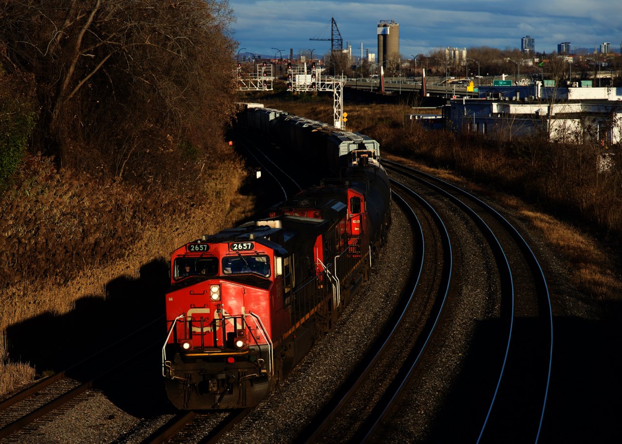 CN 527 is stopped on the Freight Track, as it gets ready to back up and leave cars on Track 29 for an X321. The sun is out on what was supposed to be a completely cloudy day.