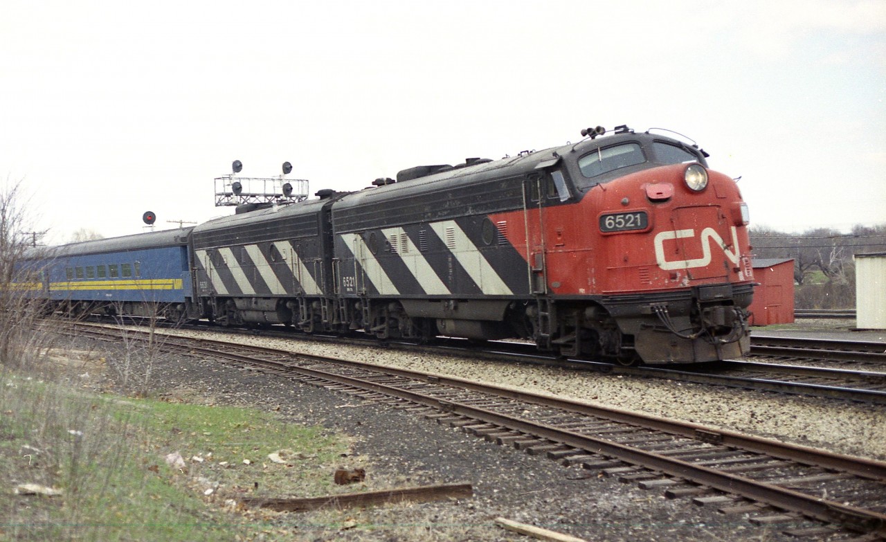 Luck of the draw, I suppose, but I rarely saw this particular while out photographing. The CN 6521 became 6308 in the rebuild program of 1983-85 and ended up with the Georgia Southwestern.
It is a rather grubby looking morning out here at Bayview Jct watching this westbound roll by. The "B" unit looks to be 6630, can't quite make it out.