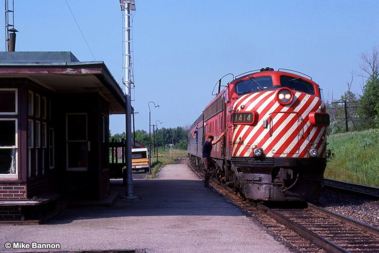 Crew member climbing off Canadan #2 at Medonte Stn