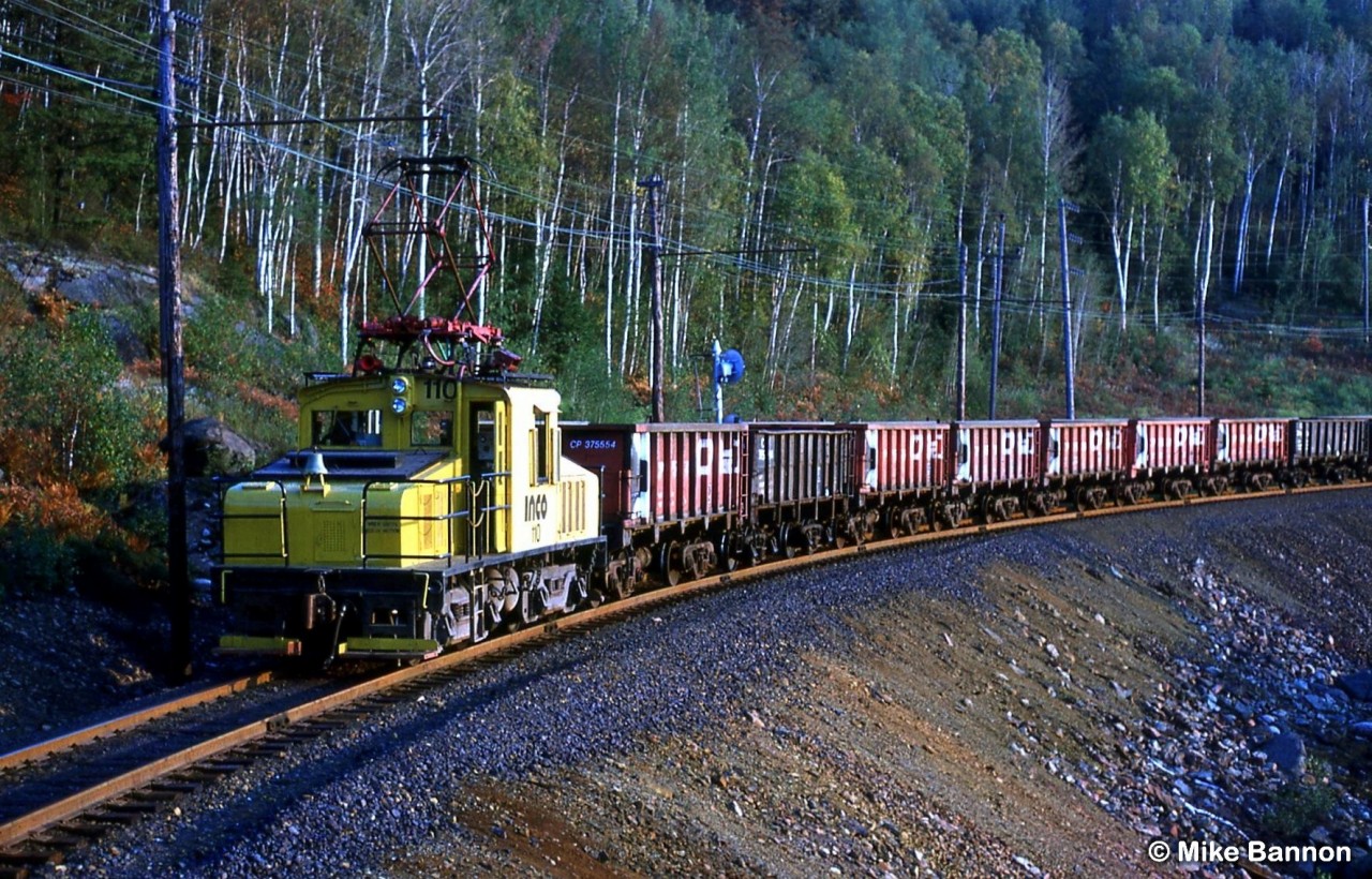 Inco 110 heading back to the mine at Onaping/Levack for reload.
Diesels now run this line the electric operations ending in the mid 1980's