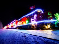 The 2024 CPKC Holiday Train sits in Qu'Appelle while the performers are playing their show. I took the opportunity to shoot some long exposures, taking inspiration from a fellow chaser who was also trackside that day and took a similar shot a few years back.