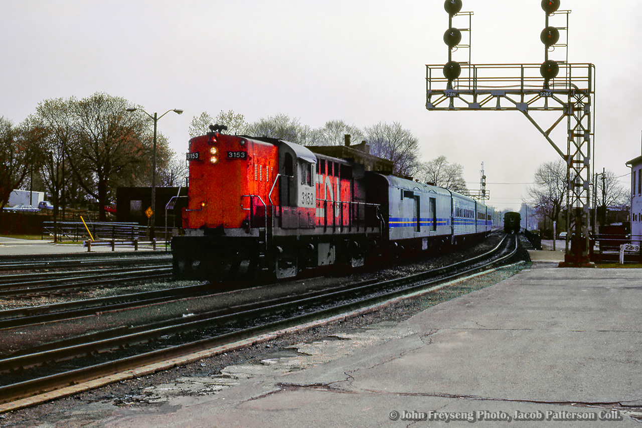 Moments after VIA 86 behind MLW FPA-4 VIA 6772 has departed, VIA 85 slows to a stop at Brantford behind leased CN Tempo RS18m 3153.

John Freyseng Photo, Jacob Patterson Collection Slide.