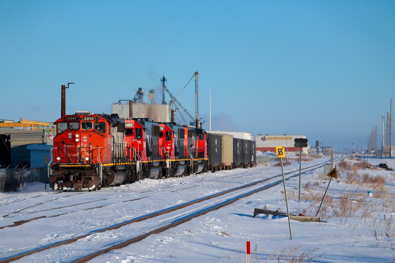 CN 1430 Yard Job works industrial Regina. Four locomotives for such a job is overkill, but makes for quite a unique consist to shoot.