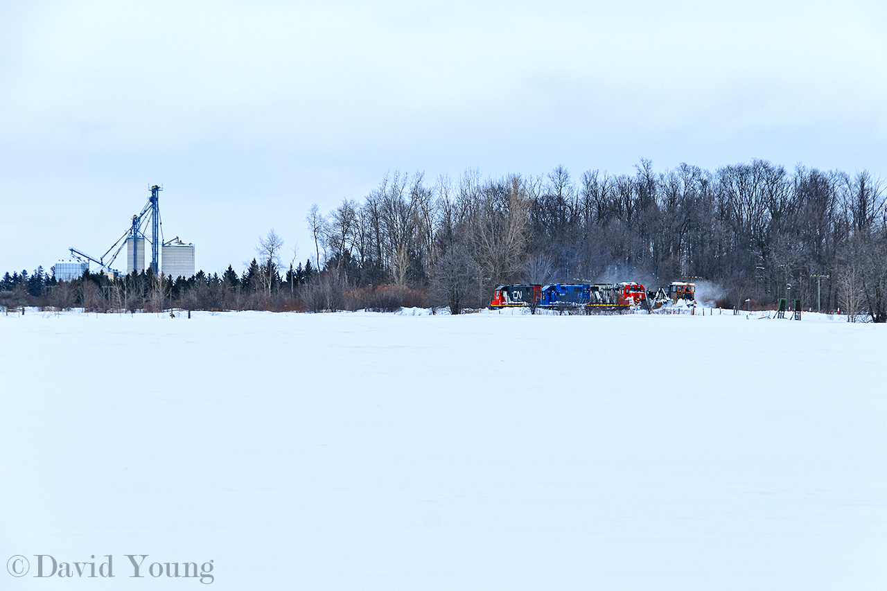 Working their way towards London, the crew of L540 is tasked with opening the Guelph Sub back up after a pair of heavy storms passed thru and no movements closed it over the weekend. The trio of geeps spell a bit of exhaust pushing the spreader and kicking up some snow as they lumber along at lazy speeds not exceeding 15 mph. It appeared as tho the old spreader wasn't 100% with one wing chained. The crew will run into London, wying at Pottersburg and returning towards Stratford, meeting 568 at Kellys.