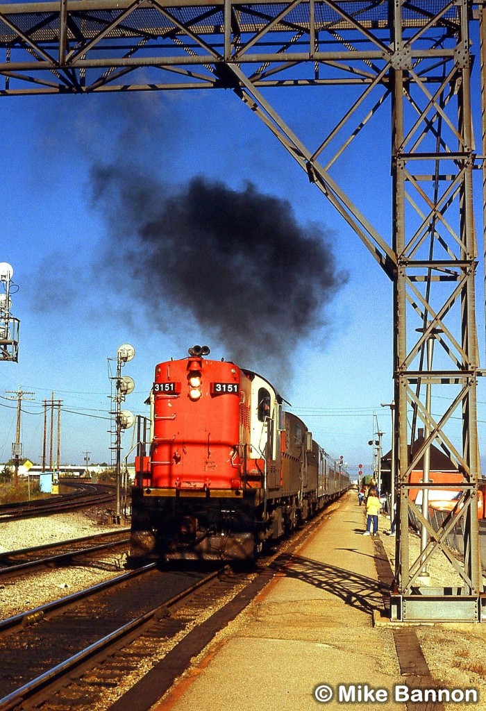 Tempo 3151 smoking it up leaving Burlington West Station WB