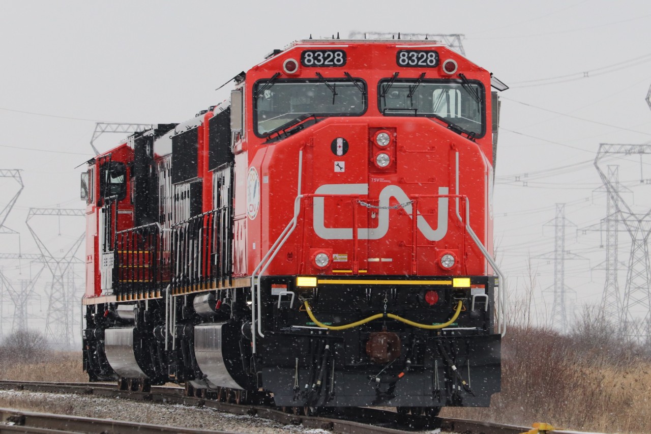 CN L502 rests in Garnet yard in Garnet, ON, on a cold frigid winter day. This train would feature 2 brand new rebuilt SD75IACCs, rebuilt from SD75is.