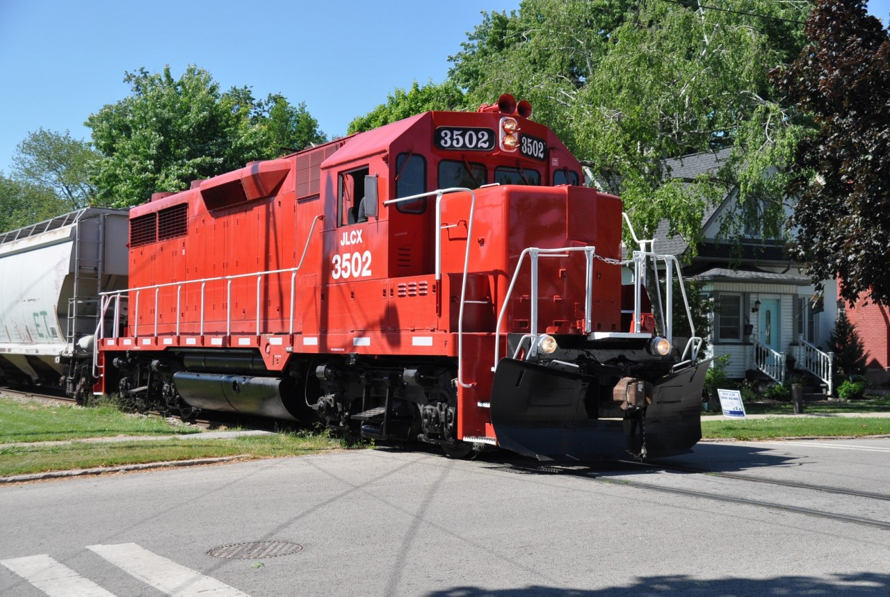 Leased JLCX 3502 is seen on a beautiful morning coming back from the yard down by Sugarloaf Harbour with a half dozen cars. The railroad regularly switches at the old Robin Hood building about a mile north along the canal.
This image was shot at Kent St in the lower city.
I've not seen this unit around recently.  Has it been returned? Is it out of service?