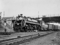 CNR 6068 departs Hamilton timetable eastbound on what appears to be train 94, <i>The Maple Leaf,</i> based on the NYC Pullman sleeper in the consist.

<br><br><i>Reg Button Photo, Bob Bratina Collection.</i>