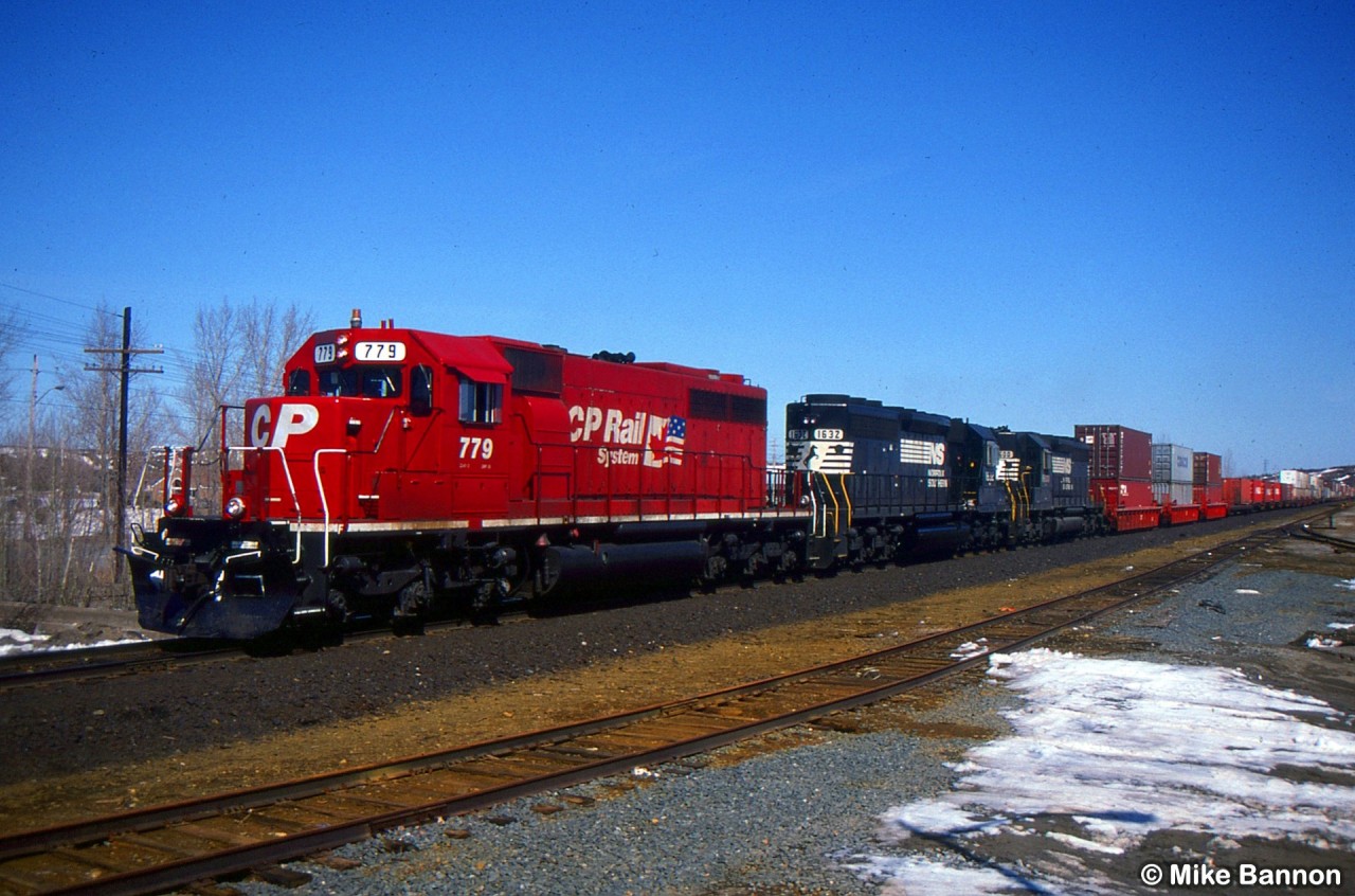 CP 779 with 2 ex-NS high nose SD40's in tow which CP purchased