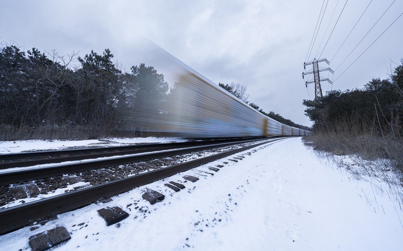 The tail end of CP's H17 job rolls through Mount Pleasant on the North Toronto Sub in the Rosedale neighbourhood of the city on a chilly and snowy January evening, loaded with fresh Honda's for delivery. This guy had air pressure issues at Weston on the Mactier Sub which held the train up for a few hours, leading to me shooting him at dusk as opposed to the middle of the day with better light.