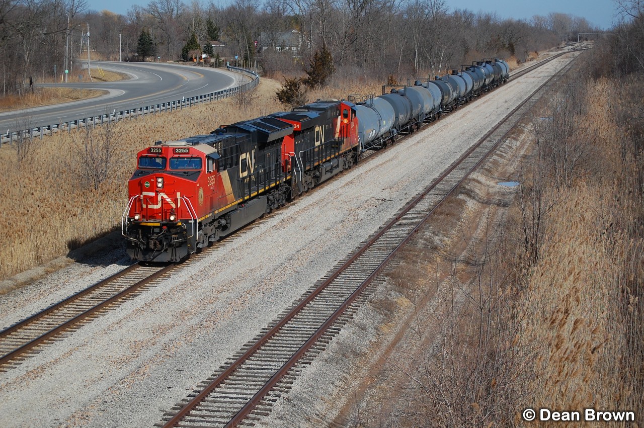 L56231 13 with CN ET44AC 3255 and CN ES44AC 3834 with 9 cars for GIO Railway (Feeder) as they pass at Mile 14 on the CPKC Hamilton Sub.
