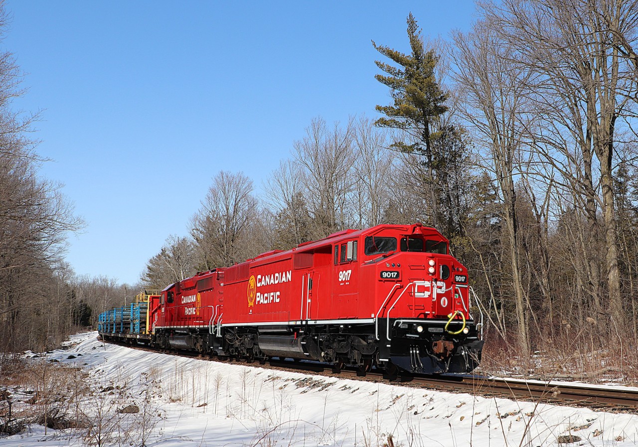 After sitting for several days tied down in Milton, the CWR train was finally ready to lay some rail down the Hamilton Sub. It then had to wait for several trains to make their ways up and down the Sub before heading down itself. First, CPKC 239 made its way up and cleared west. The second was CPKC 238 which headed down light power. Thirdly, CPKC 236 made its way down followed closely by the CWR train. The SD40's drew quite the crowd as they finally made their way down. SD40-2F, CP 9017, with SD40-2, 6011 lead the CWR train up to the 3rd line as they head south to lay rail along the Hamilton Sub. The bright sun and nice clean paint made for a good day.