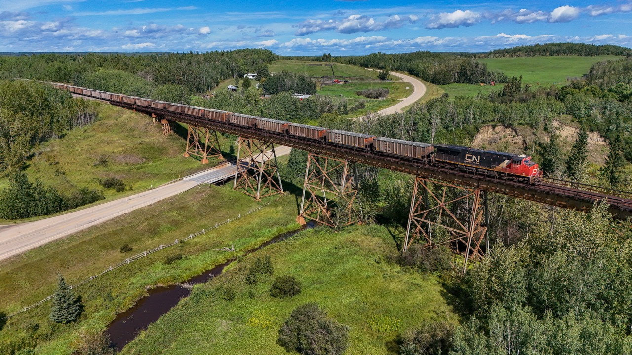 S 70451 26 cruises across the Magnolia Trestle with an empty sulphur train.