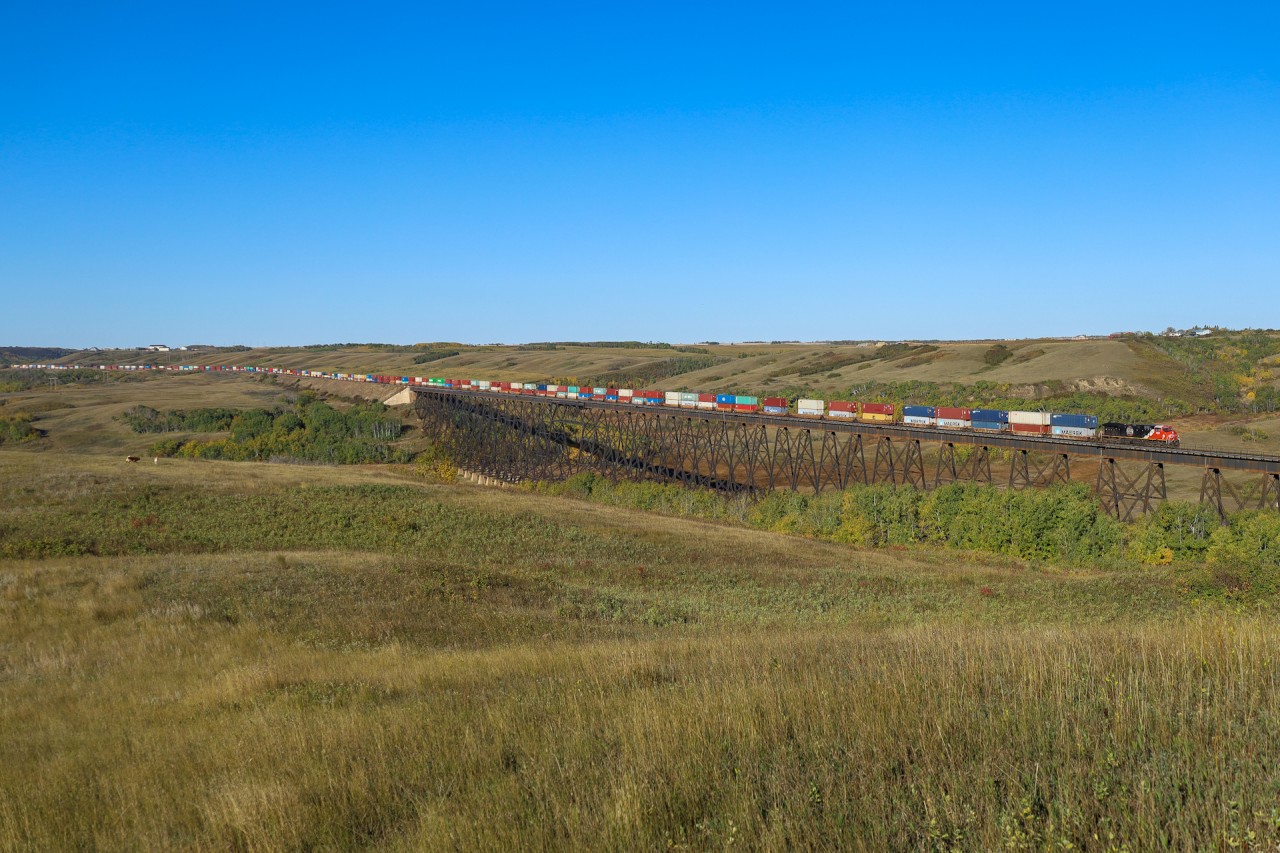 Q 18051 27 cruises across the Fabyan Trestle with CN 3331 leading.