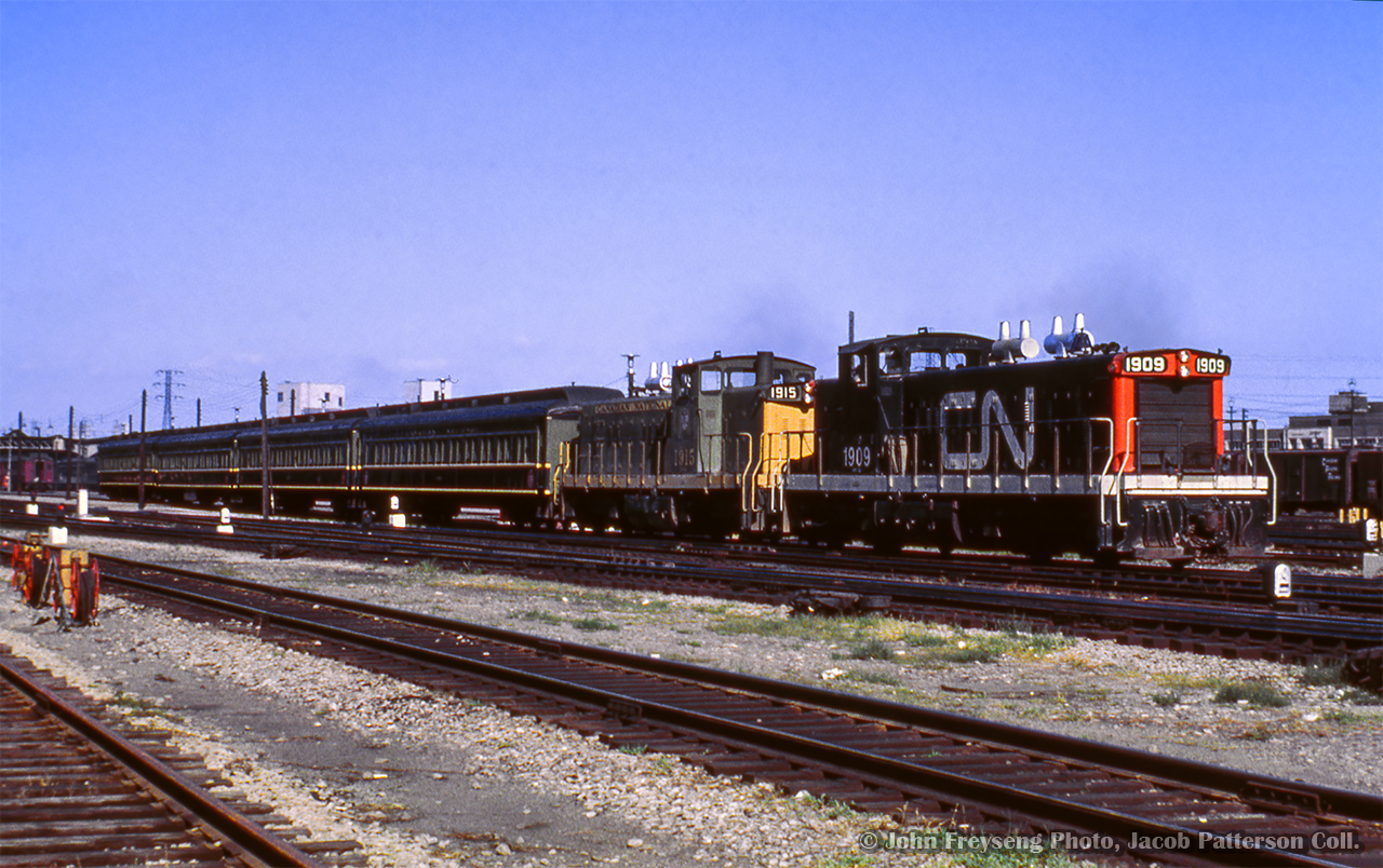 Almost off the platforms of Union Station, CNR commuter train 911, bound for Guelph, departs behind a pair of GMD1s.

John Freyseng Photo, Jacob Patterson Collection Slide.