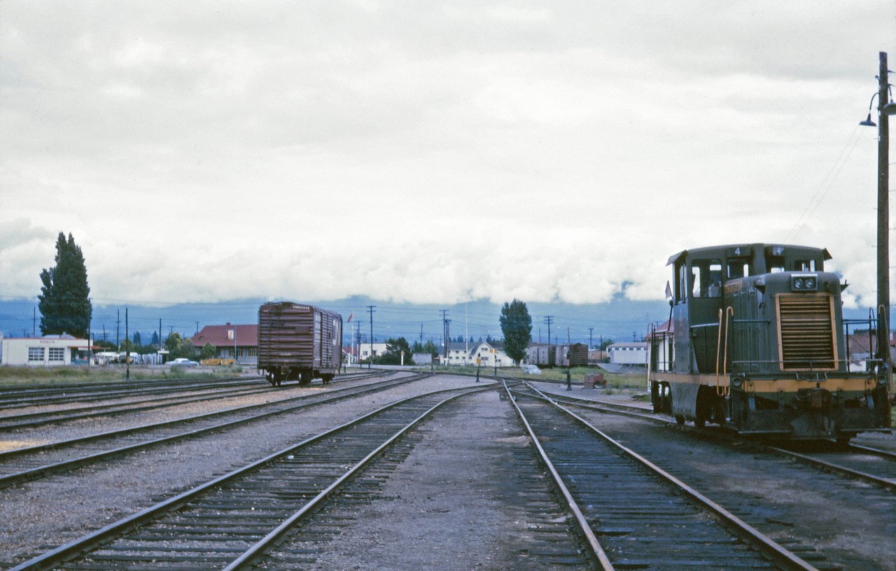 The clouds are low and things are quiet in Kelowna yard where a lone lumber box and 44 tonner 4 sit, accompanied by a couple of reefers and an insulated box car at the team track in the distance. Not too long ago, you might find the Railiner from Kamloops awaiting its 6:30 PM departure (arriving at 11:00 AM after a three hour, 30 minute run)--this train was shown in the October 1962 passenger time table but gone a year later...Number 4 would be retired in May 1967 and sold to Stelco in Edmonton; it was donated to the Alberta Railway Museum in 2012.