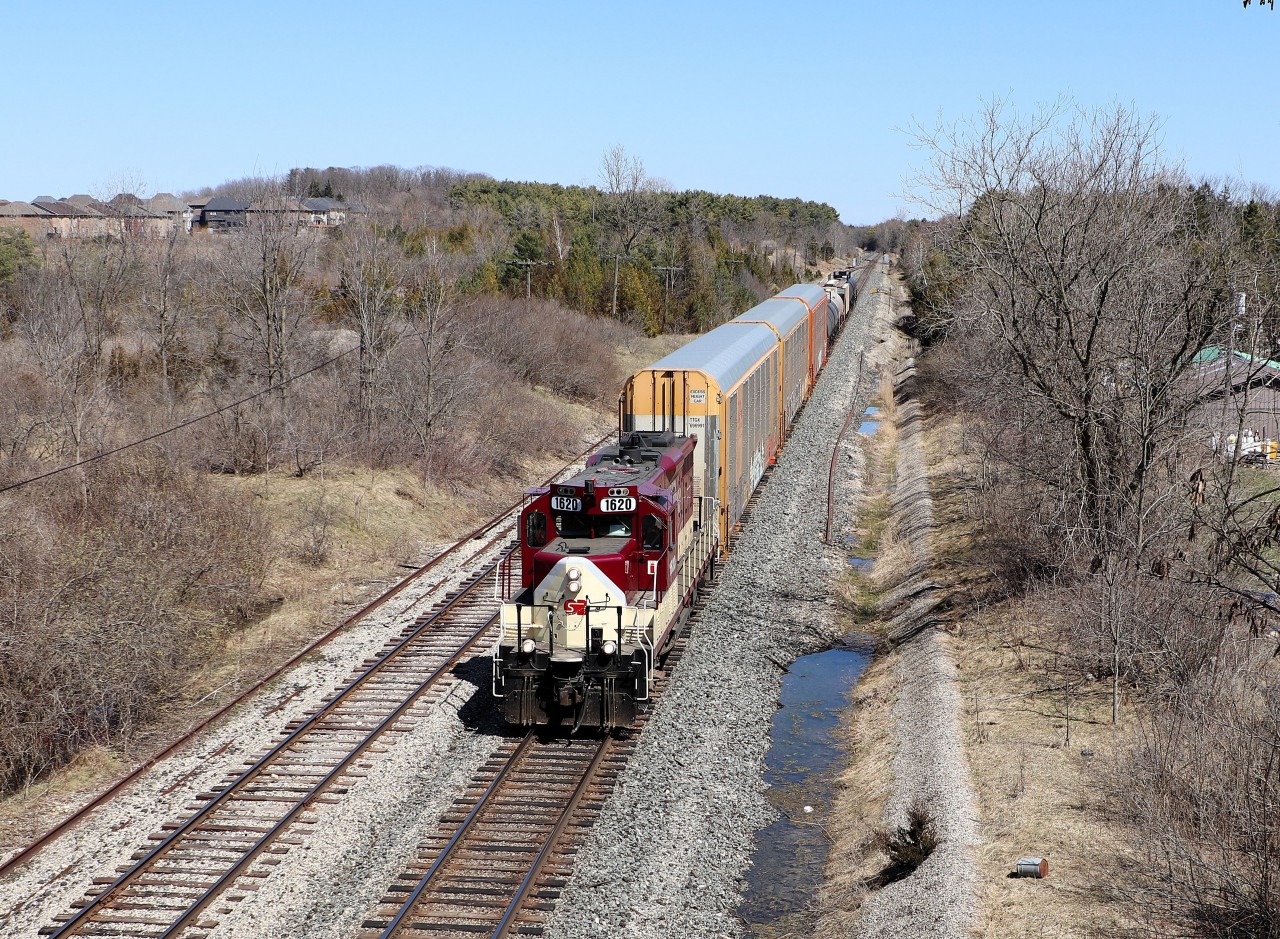 After dropping off a string of cars in the west siding at Blandford, OSR 1620 heads west up the Galt sub main track at mile 60 on its return trip back to the St Thomas sub. Built in 1957, the GP9u is still going strong some 68 years later.