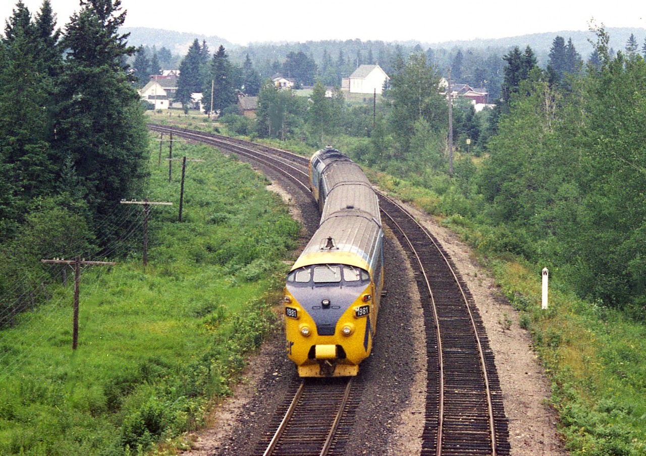 The ONR's Northlander showed great promise when it was introduced and did its first run June 9, 1977. This image is but 7 weeks later, with ONR 1981 (x-1901) heading south thru Sundridge on its way to Toronto from Cochrane. Known as the "TEE" train (Trans Europe Express), the power was not up to snuff with the cold Ontario winters and such, so these power units were retired by 1980 (and scrapped 1984) with F units taking over. Upkeep of these trains was poor, ridership was weak; and the train discontinued 2012.  The current Doug Ford government sure dragged its heels on its promise to reinstate this train; but word has it now new Siemens Venture trainsets will be the equipment when the train comes back on line in mid 2026.  Looking forward to it !!