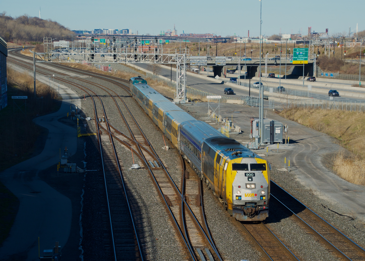 Class leader VIA 900 leads VIA 37 with a non-Siemens consist past Turcot Ouest.