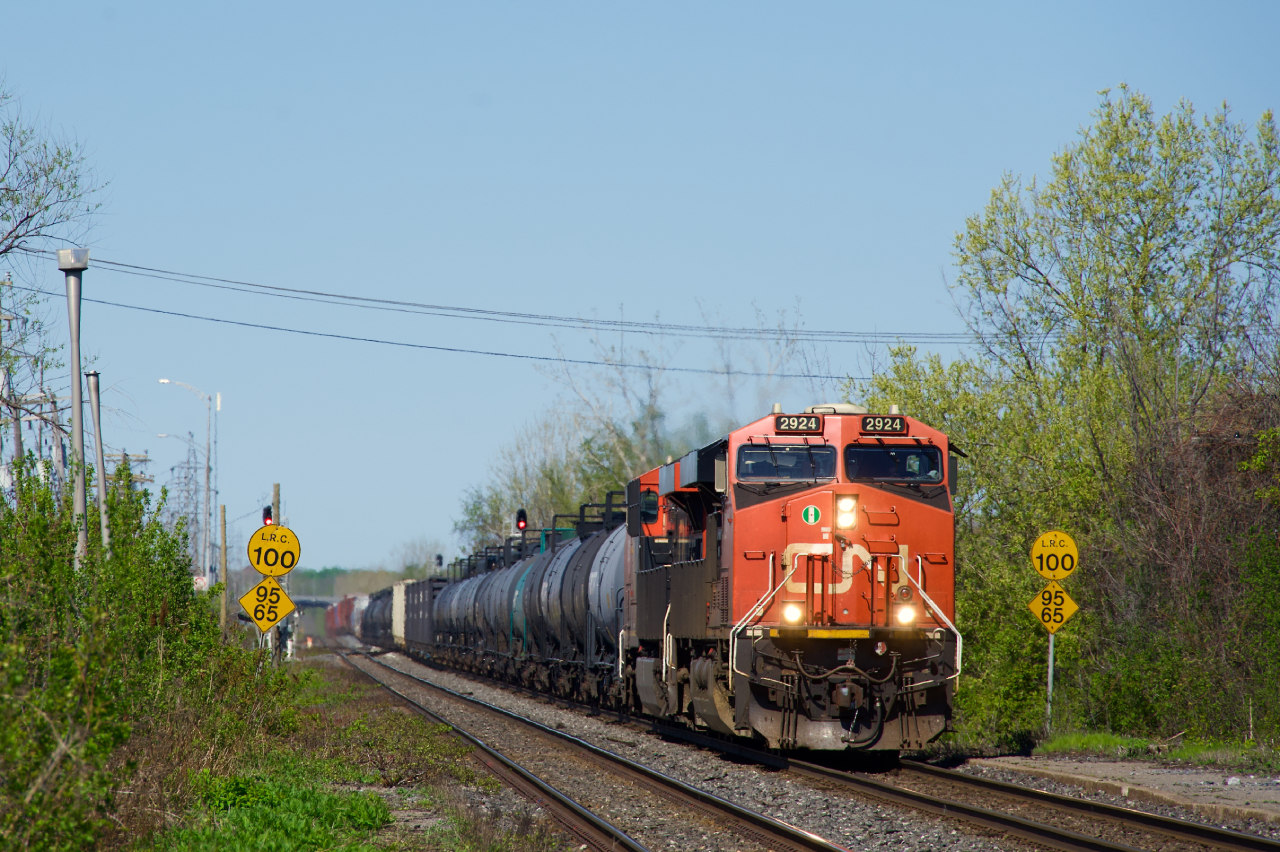 CN 368 is about to pass Dorval Station with CN 2924 leading another ES44AC.