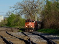 CN YRP003 is about to climb a steep enough grade as it lifts seven boxcars in two cuts from client GETPAQ. Afterwards, they will spot seven more cars. CN 4795 & CN 4760 provide the power on this train which reaches the client by the Longue-Pointe Spur.