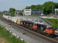 CN 120 heads east with a trio of GEVOs up front.