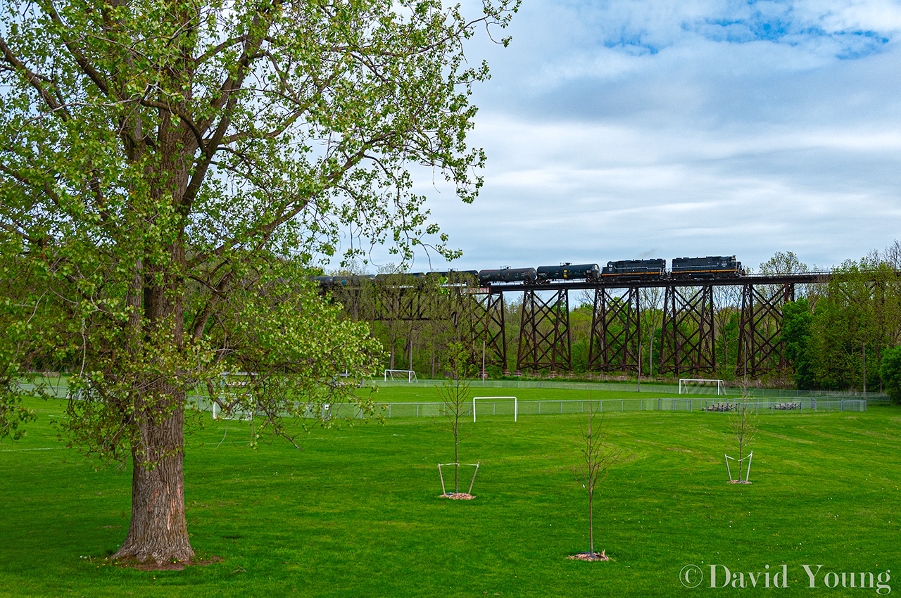 Athletic Park. A different perspective and not a common photo angle that has been afforded until recently. GIO Rail with their pair of plain jane painted GP38-2's shove 43 tanks towards Southwold yard. Cars coming to GIO have picked up over the past month as the storage season ramps up.